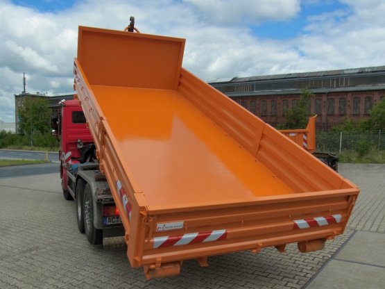 HÜLLENKREMER Containerbau NRW - Abrollcontainer-Kippaufbau mit Stahlbordwänden