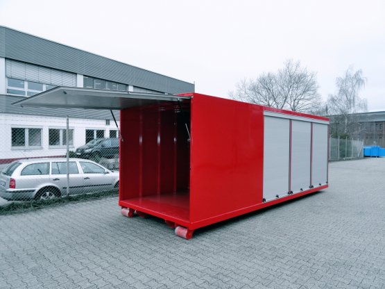 HÜLLENKREMER Containerbau NRW - Feuerwehrcontainer - Feuerwehr-Abroll-Container in geschlossener Ausführung mit seitlichen Rolläden und großer Heckklappe